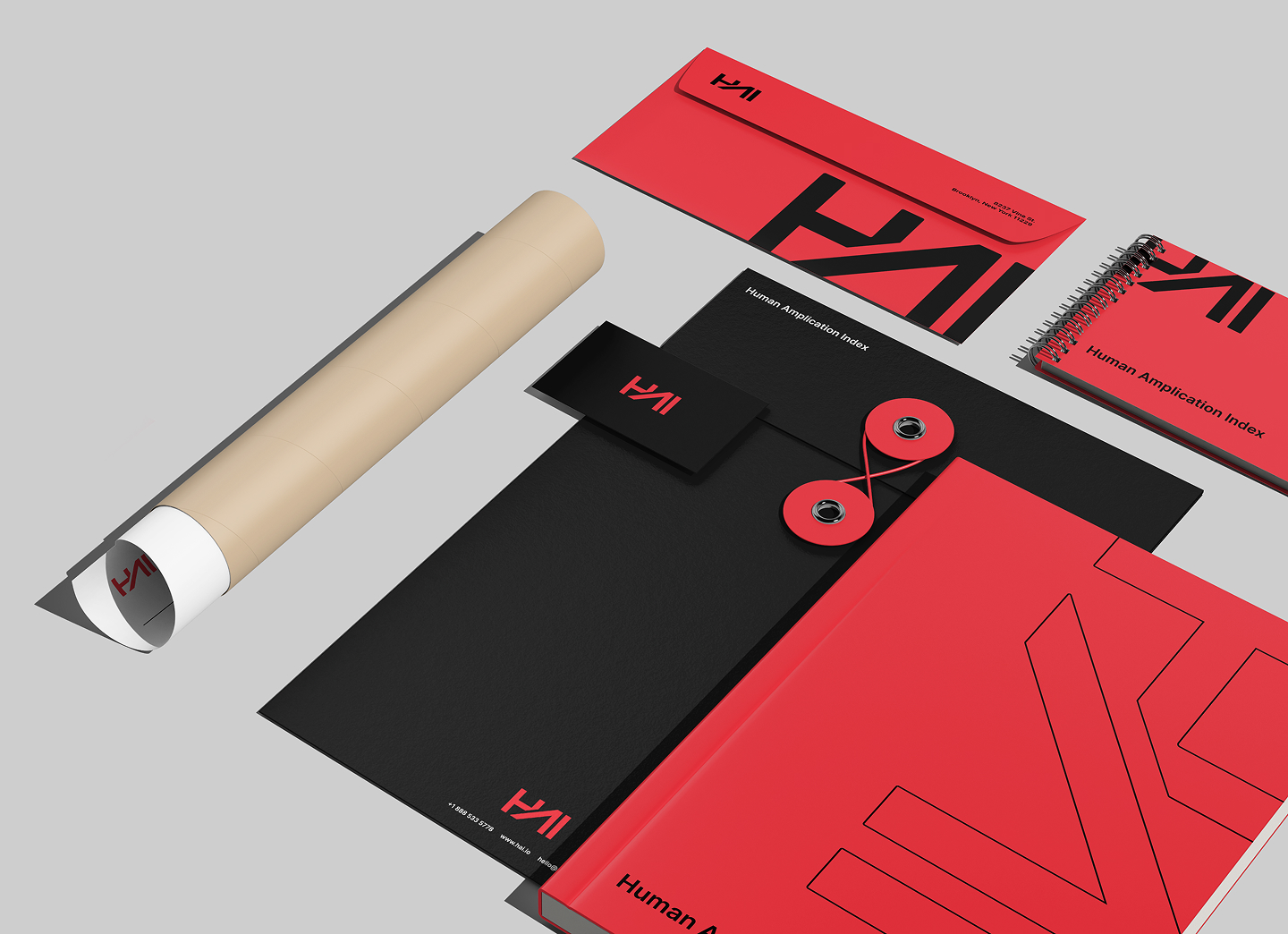 Human Amplification Index branded stationery in red and black